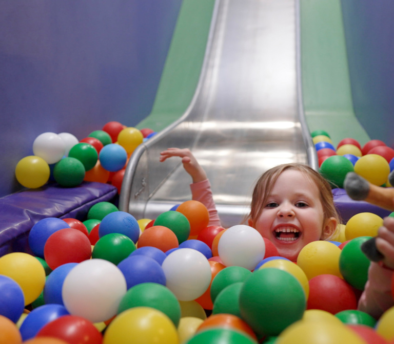 Toddler breaks kids in the ball pit
